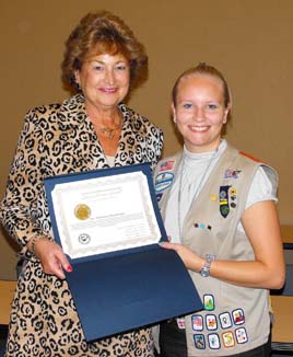 Freeholder Director McMorrow presents a Citizen Service Award to Maj. Kristina Kristensen